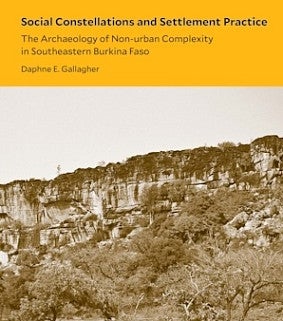a book cover with a yellow shape with the title on top of a photo of a cliff
